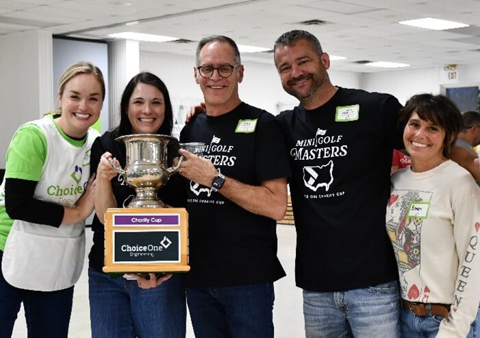 Sugarcreek Township team posing with the Choice One Charity Cup.
